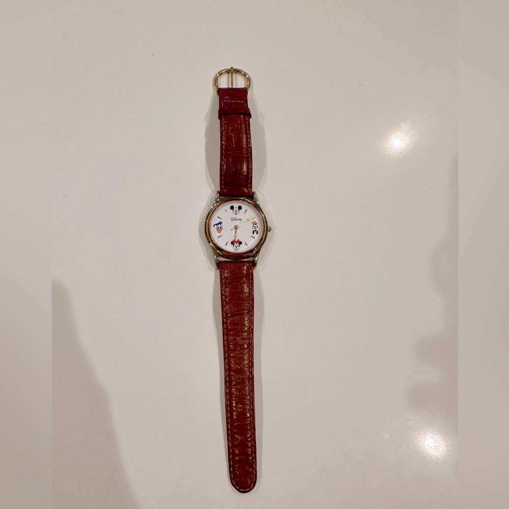Disney “vintage” watch, brown leather band. Does not work.